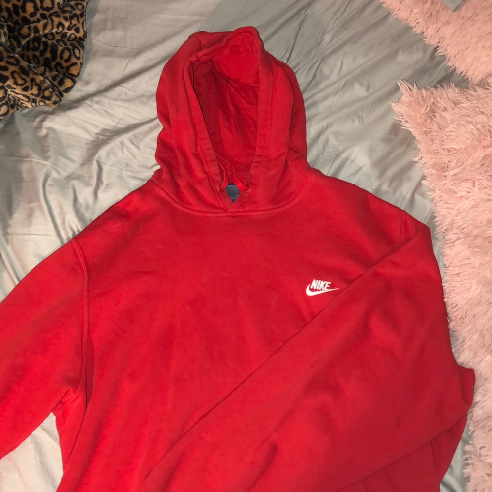 red Nike sweatshirt